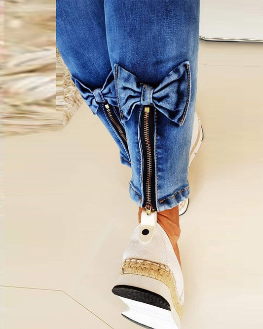Slant Pocket Bowknot Zipper Skinny Jeans