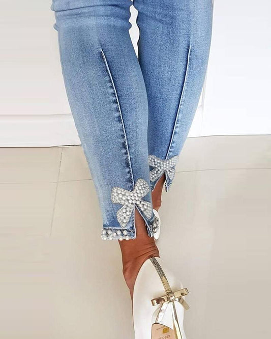 Beaded Slit Bowknot Decor Jeans