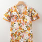 Russet Orange Ruffled V Neck Scalloped Short Sleeve Floral Blouse