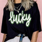 Black St Patricks Day lucky Cracked Letter Graphic T Shirt