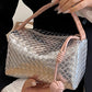 Silvery Lattice Texture Corded Ball Decor Weaven Handle Cosmetic Bag