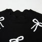 Black Bow Print Side Ties Scalloped Hem Sweater T Shirt