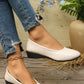White Textured PU Leather Pointed Toe Wedge Heel Shoes