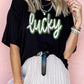 Black St Patricks Day lucky Cracked Letter Graphic T Shirt
