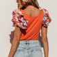 Orange Ribbed Knit Tiered Ruffled Sleeve Bodysuit