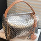 Silvery Lattice Texture Corded Ball Decor Weaven Handle Cosmetic Bag