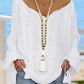 Polka Dot Print Tassel Design Lantern Sleeve Dip Hem Blouse Casual Top