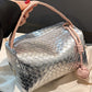 Silvery Lattice Texture Corded Ball Decor Weaven Handle Cosmetic Bag
