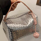 Silvery Lattice Texture Corded Ball Decor Weaven Handle Cosmetic Bag