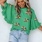 Green Sequin Doughnut Graphic Ruffled Trim Bell Sleeve Mardi Gras Blouse