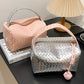 Silvery Lattice Texture Corded Ball Decor Weaven Handle Cosmetic Bag