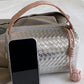 Silvery Lattice Texture Corded Ball Decor Weaven Handle Cosmetic Bag